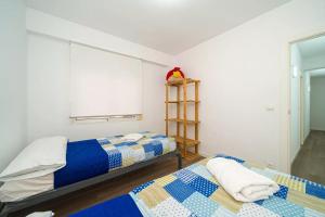 Posteľ alebo postele v izbe v ubytovaní Apartamento Ideal en Villajoyosa