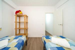 Posteľ alebo postele v izbe v ubytovaní Apartamento Ideal en Villajoyosa