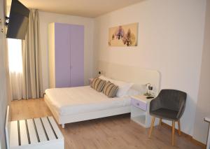Letto o letti in una camera di Alle Porte