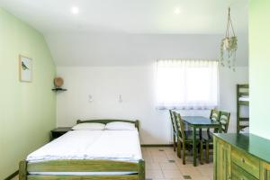 Postel nebo postele na pokoji v ubytování Villa & Domek Maja