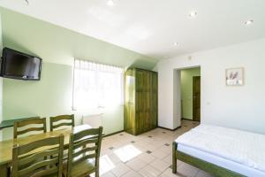 Postel nebo postele na pokoji v ubytování Villa & Domek Maja