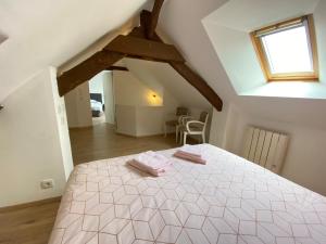 Posteľ alebo postele v izbe v ubytovaní Petite maison dans la prairie