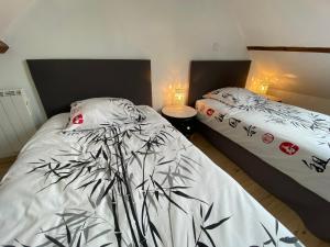 Posteľ alebo postele v izbe v ubytovaní Petite maison dans la prairie