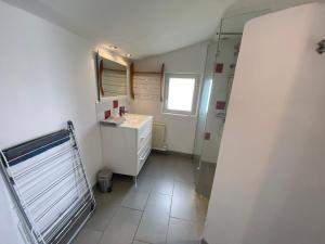 Kúpeľňa v ubytovaní Petite maison dans la prairie