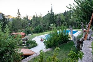 Bazén v ubytování Trinitys Forest Bungalows nebo v jeho okolí
