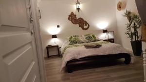 Llit o llits en una habitació de La belmontaise