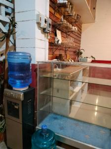 a glass tank sitting on top of a machine at Casas del Salvador (Airbnb) Private Room #9 in Valencia