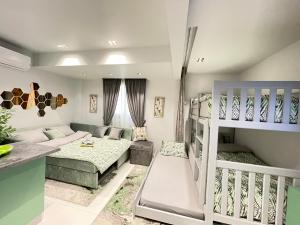 a living room with a bunk bed and a couch at Luxury Studio House 589-3 in 6th Of October