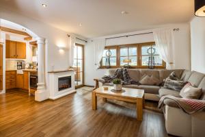 Posezení v ubytování Ferienwohnungen Reich + 30 fotografií