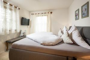 Postel nebo postele na pokoji v ubytování Ferienwohnungen Reich