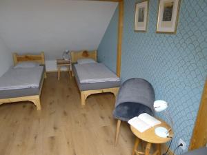 Postel nebo postele na pokoji v ubytování Apartmán Bellevue - Český ráj