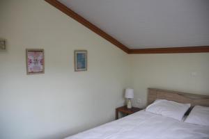 Postel nebo postele na pokoji v ubytování Villa Anta