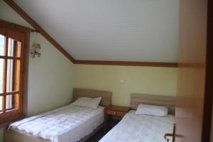 Postel nebo postele na pokoji v ubytování Villa Anta