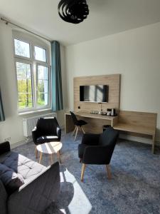 Pension zum Kleistpark的电视和/或娱乐中心