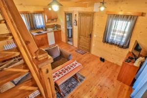 an overhead view of a living room in a log cabin at Vinogradina Eco Vukčević in Virpazar
