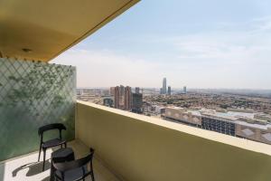 A balcony or terrace at Luxury Studio Apartment JVC Tower 108 Dubai