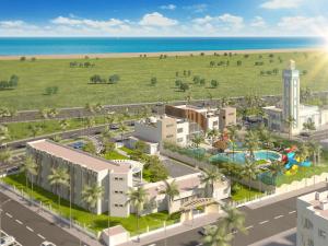 an artist rendering of a resort planned for the beach at joli appartement près de la mer in Casablanca