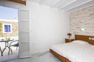 Postel nebo postele na pokoji v ubytování Naxos Holidays