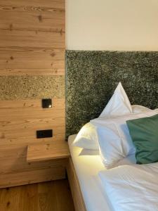 מיטה או מיטות בחדר ב-Schöne Aussicht