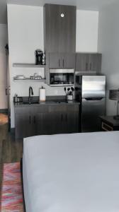 Kuchyň nebo kuchyňský kout v ubytování Bunk House