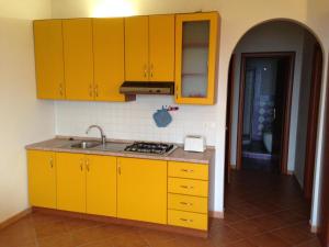 Kuchyň nebo kuchyňský kout v ubytování Residence Floritalia - Ricarica auto elettriche