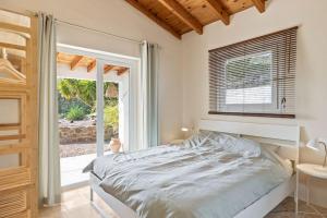 Postel nebo postele na pokoji v ubytování Paradise in Andalusia