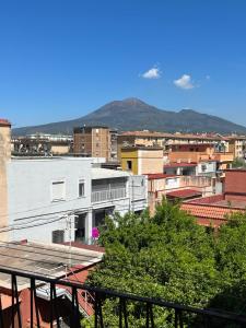 a view of a city with mountains in the background at CASADOMA Oplonti Pompei in Torre Annunziata
