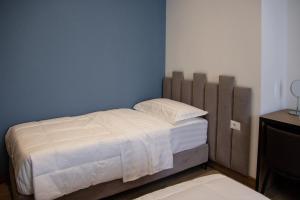 Letto o letti in una camera di Hotel Blini