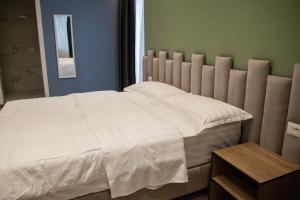 Letto o letti in una camera di Hotel Blini