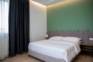Letto o letti in una camera di Hotel Blini