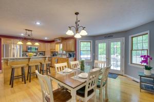 a kitchen and dining room with a table and chairs at Massanutten Home Rental with Sauna and Game Room! in McGaheysville