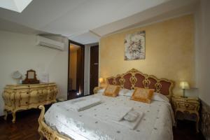 Postel nebo postele na pokoji v ubytování Residenza Bra Verona