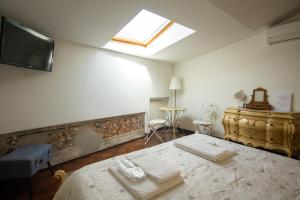Postel nebo postele na pokoji v ubytování Residenza Bra Verona