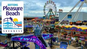 an amusement park with a ferris wheel and a carnival at The Cresswell Inn in Skegness