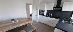 Kuchyň nebo kuchyňský kout v ubytování Ferienwohnung Sheni