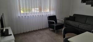 Posezení v ubytování Ferienwohnung Sheni