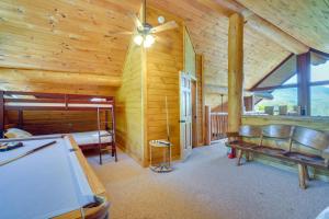 a room with a pool table in a cabin at Smoky Mountain Vacation Rental with Hot Tub! in Gatlinburg