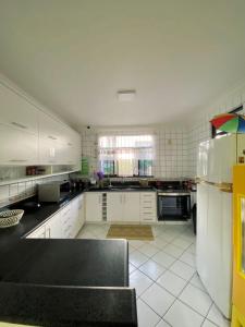 Kuchyň nebo kuchyňský kout v ubytování Hostel Da Jô