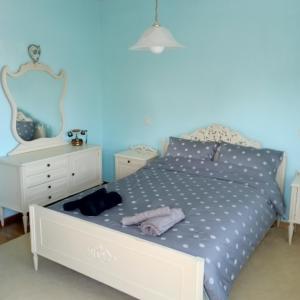 Krevet ili kreveti u jedinici u objektu Διαμέρισμα τριών υπνοδωμάτιων.