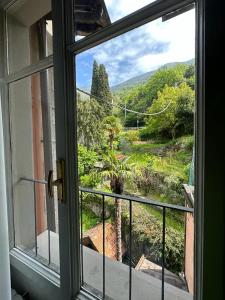 a window with a view of a mountain view at Briisa De Ness in Nesso