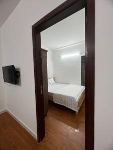 Uma cama ou camas num quarto em Sóc Apartment