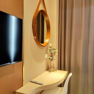 TV a/nebo společenská místnost v ubytování The Mango Suites by Flat06