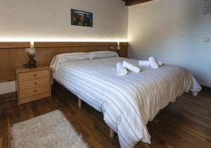 Postel nebo postele na pokoji v ubytování Hostal Etxeberri