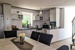 Η κουζίνα ή μικρή κουζίνα στο Infinity - Attractive villa for rest and relaxation