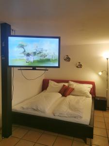 A bed or beds in a room at Studio Mario