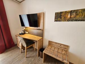 TV a/nebo společenská místnost v ubytování Hotel-Landgasthof Ploss