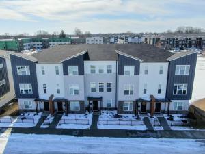 a large white building with snow in front of it at Glam & Silver Home near Convention Ctr in Indianapolis