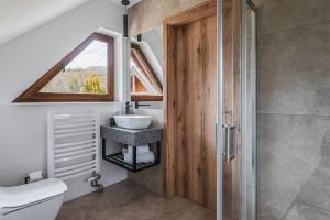 Kúpeľňa v ubytovaní Osada turystyczna Malinów + 37 fotografií
