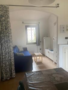 A bed or beds in a room at Residence La Conia