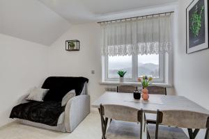 Posezení v ubytování Apartament na wzgórzu